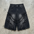 Eclipse Fringe – Distressed Denim Shorts