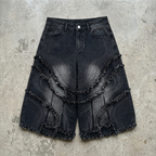 Eclipse Fringe – Distressed Denim Shorts