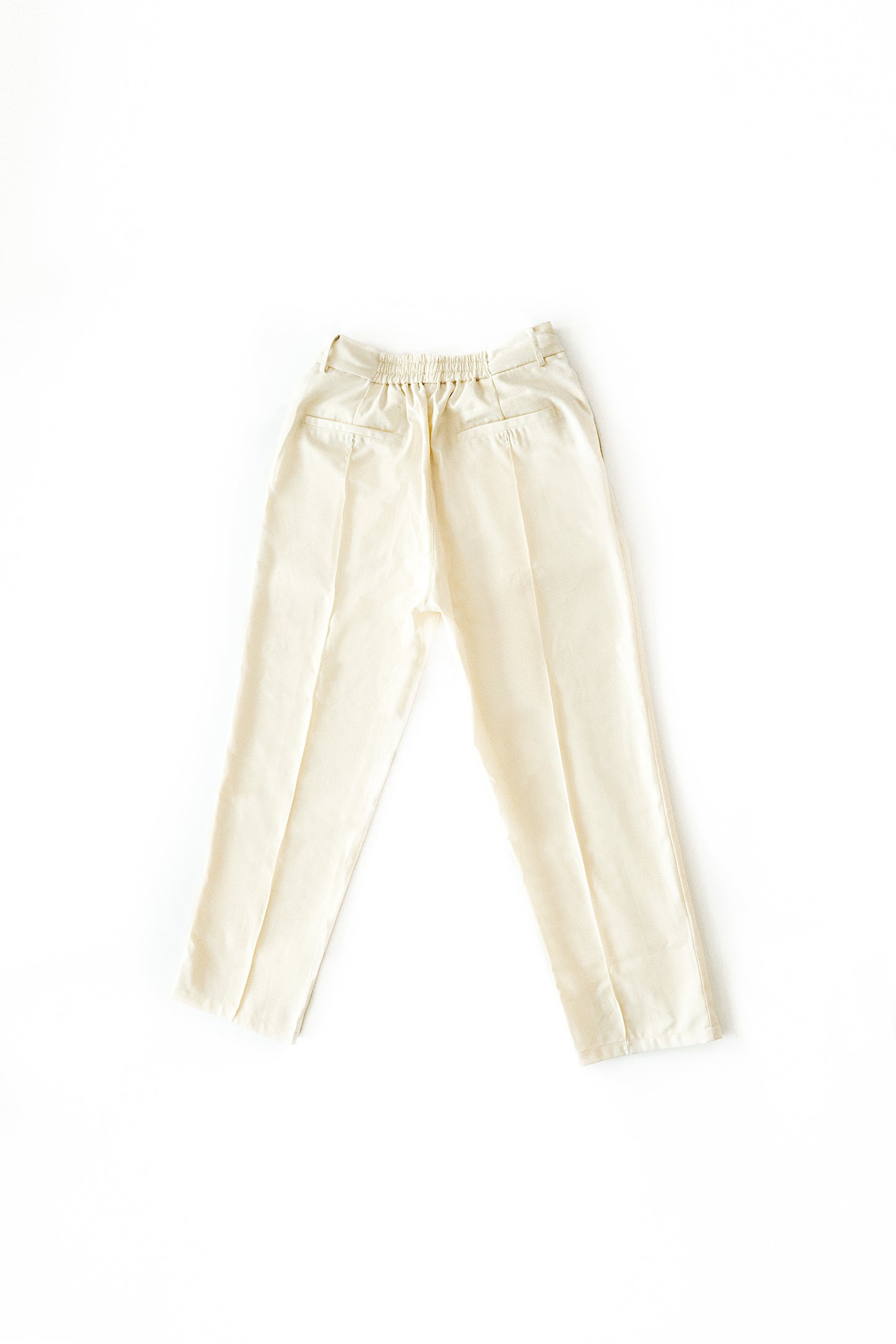 CREAM PLEATED TROUSERS