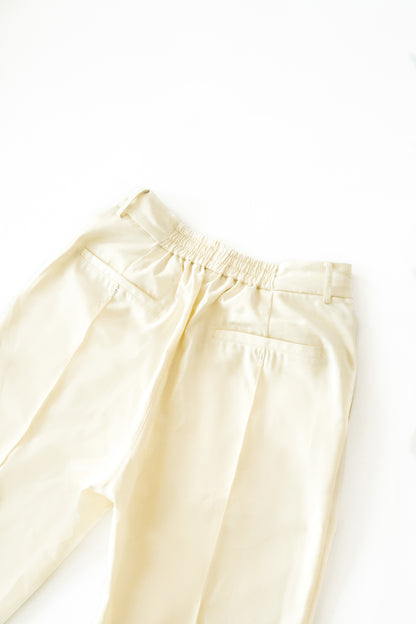 CREAM PLEATED TROUSERS